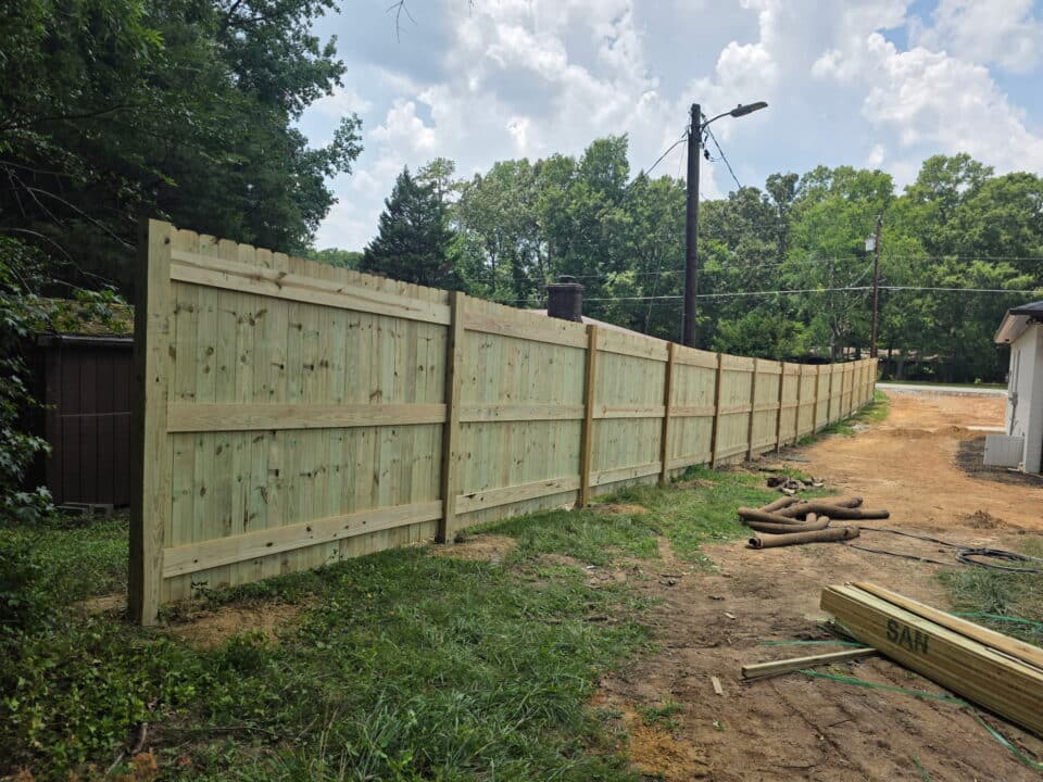 Wood privacy fence install